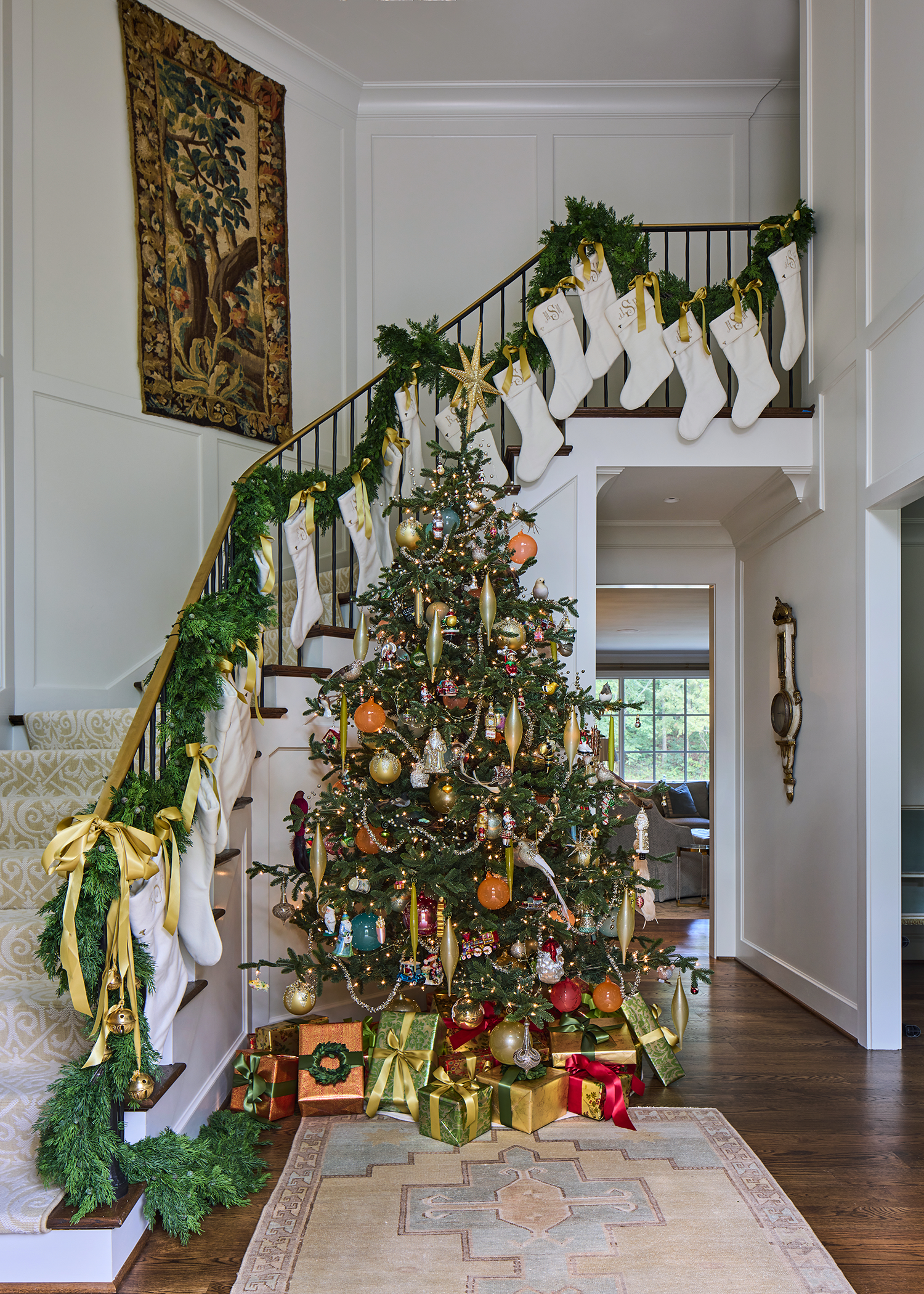 Entryway with custom family stockings in Greystone home renovation