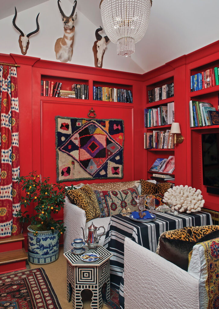 Bold red library inside Stephanie Lynton’s Birmingham home