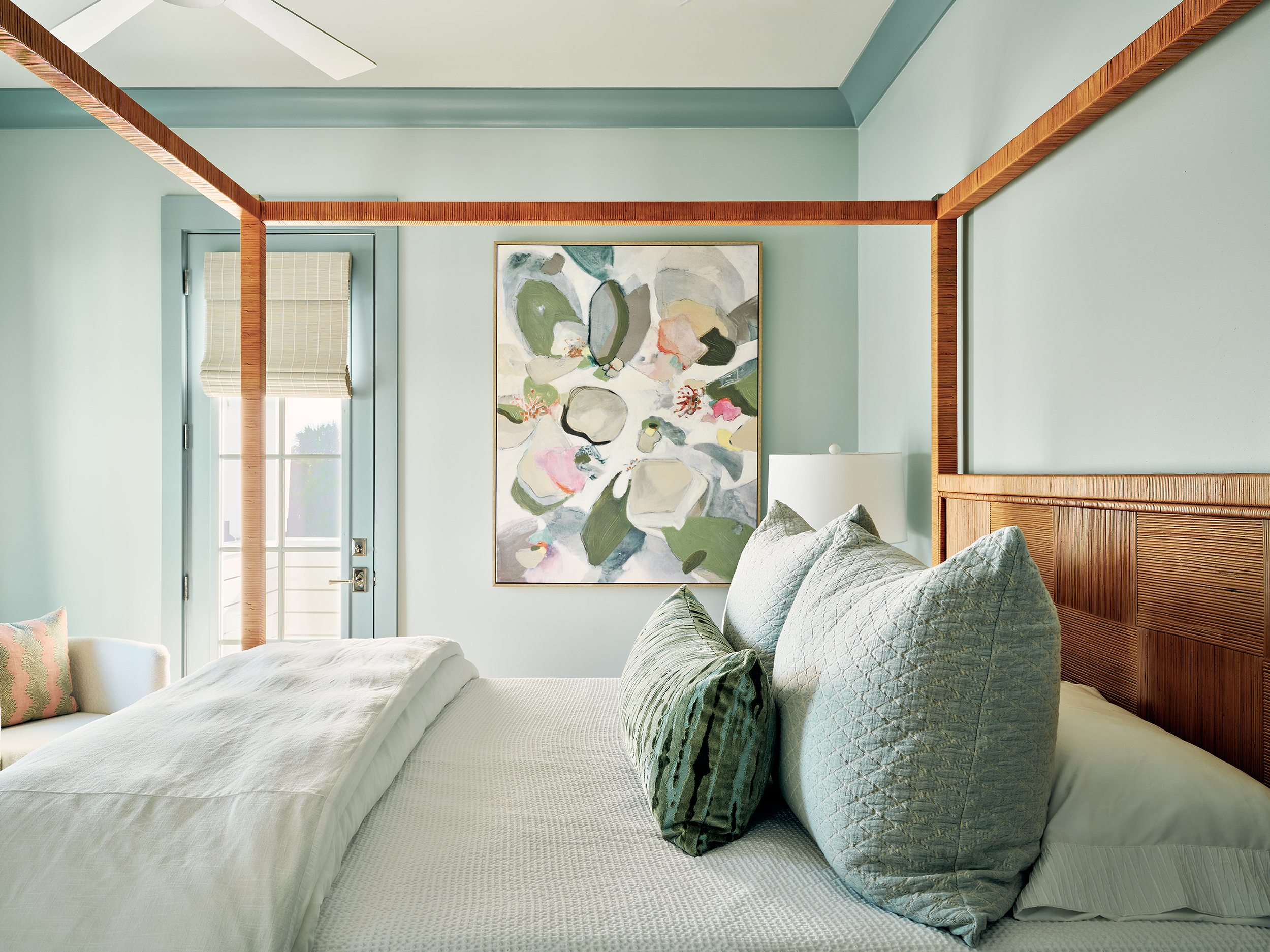 Beach house main suite four poster bed.