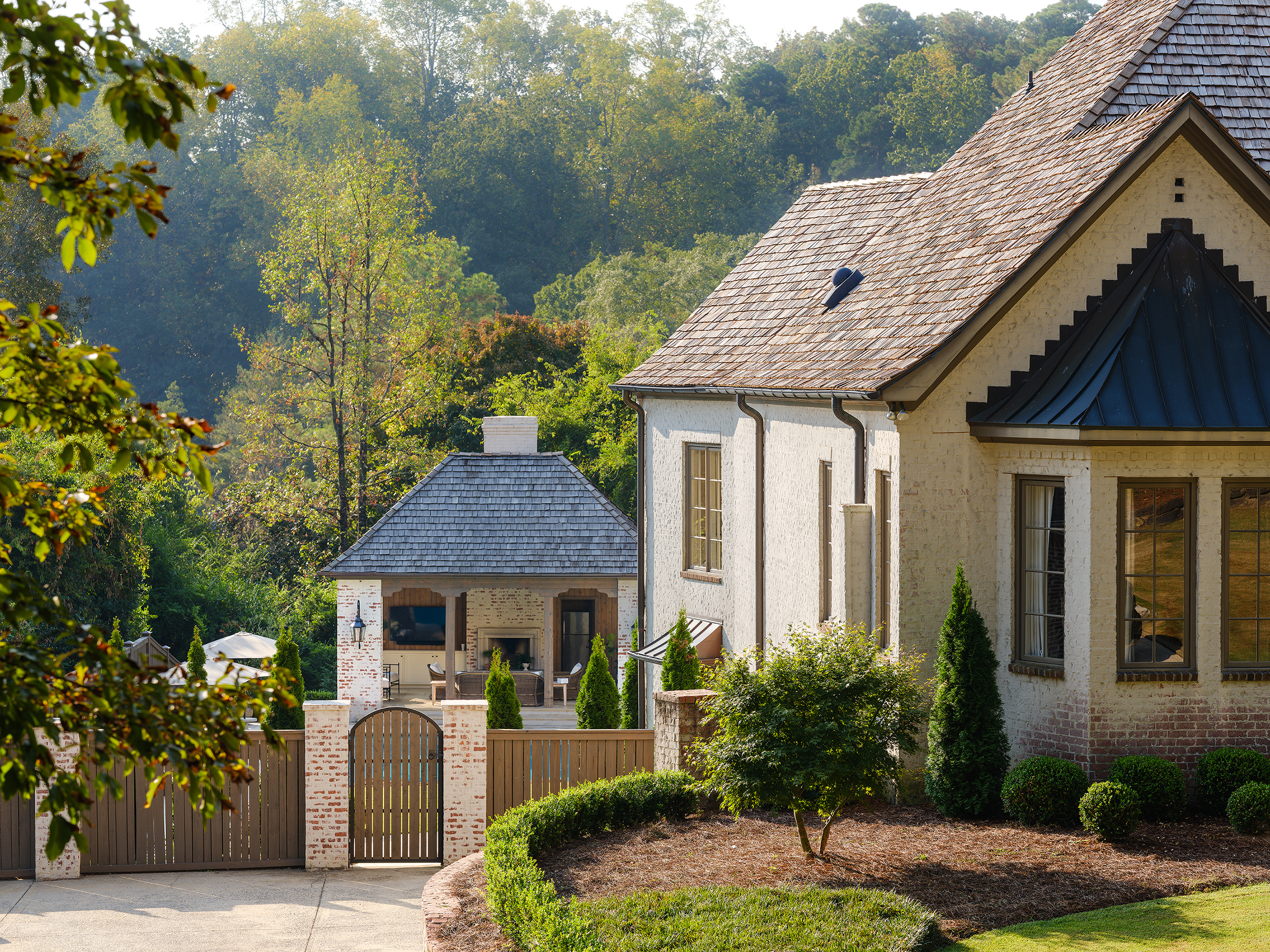 Close-up of a cedar shake roof on the Mountain Brook pool house, matching the main home's upgraded roofing material.