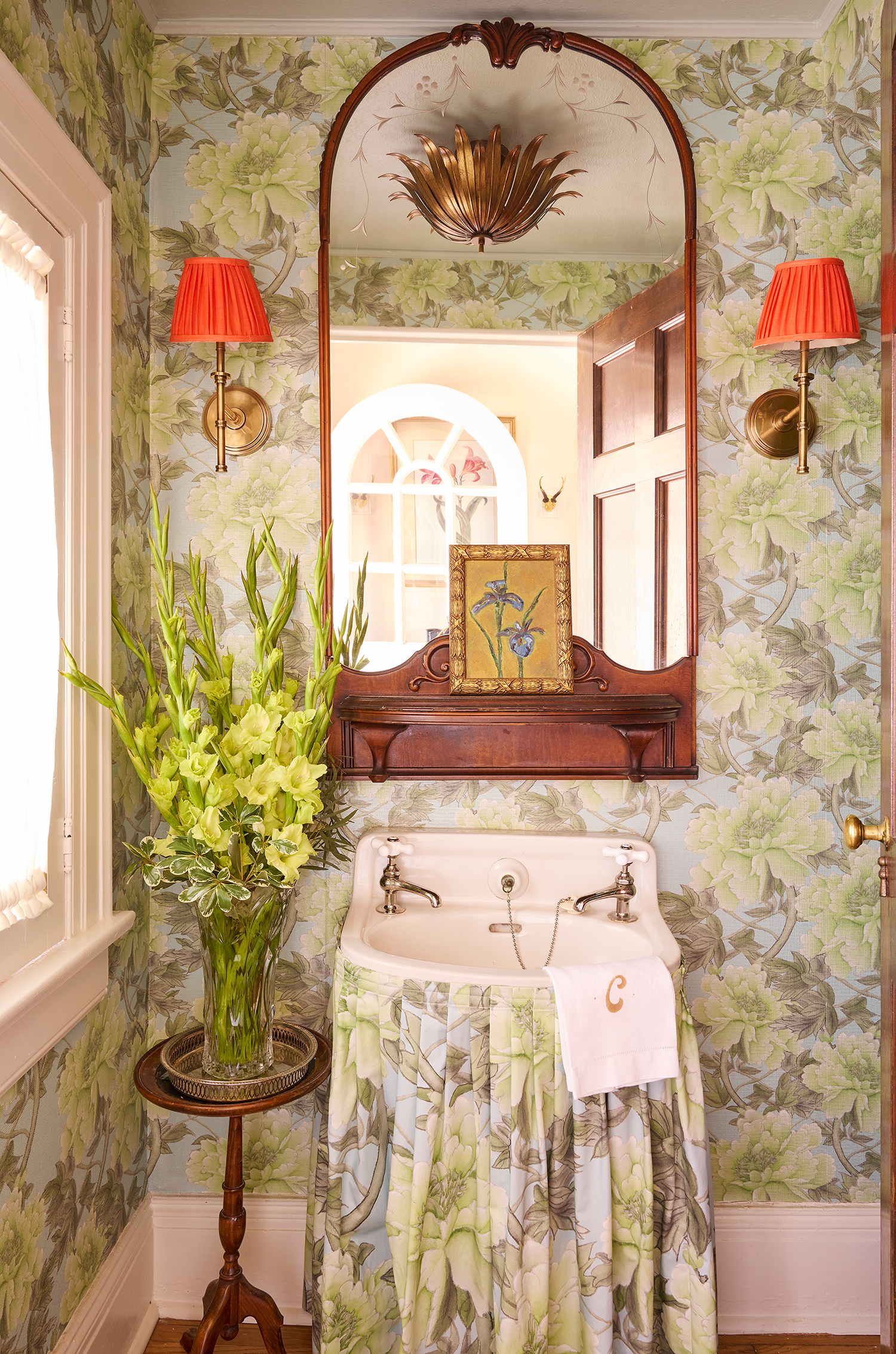 Elegantly styled bathroom in a 1929 Georgian house featuring classic fixtures and refined interior design accents.