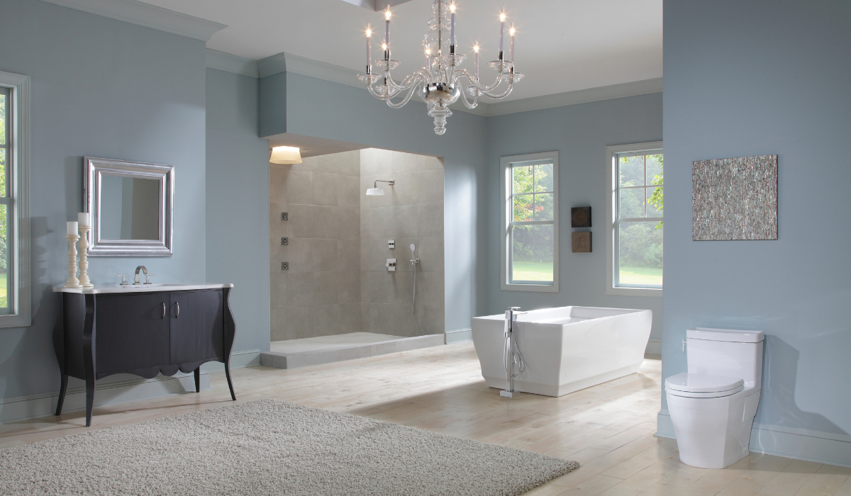 Bathroom with a freestanding tub, walk-in shower and dark vanity