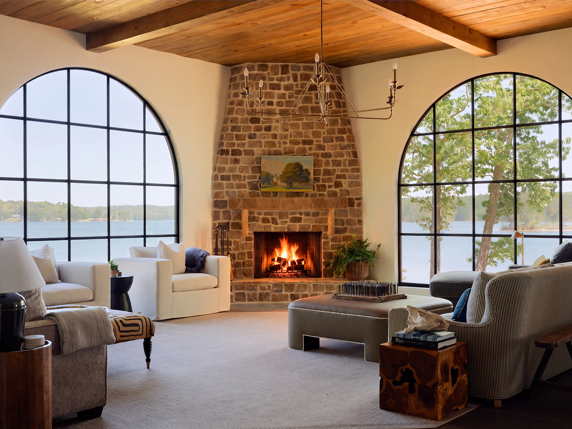 Thoughtfully positioned to take advantage of its setting, this living room captures views of Lake Martin